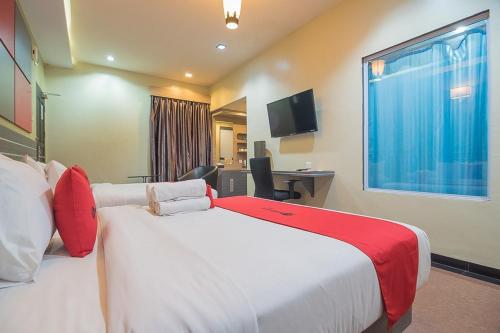 Фотография гостевого дома RedDoorz Syariah near Jalan Asahan Pematang Siantar