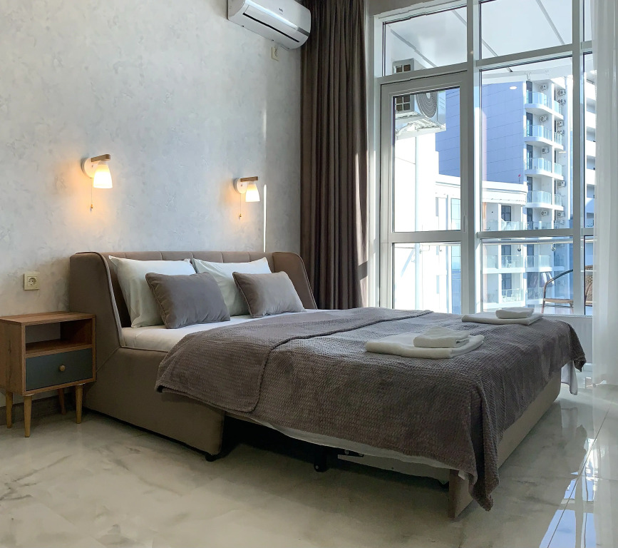 Фотография квартиры Апартаменты Славно в ЖК Sun Hills на 10 Этаже для Троих