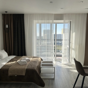 Фотография квартиры Квартира Просторная студия с панорамным видом из окна