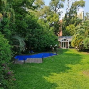 Фотография гостевого дома Casa con hermoso Jardin, Pileta y Quincho en Pilar