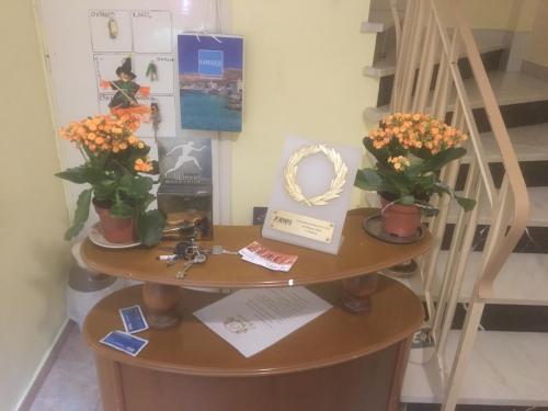 Фотография гостевого дома Olympiades Rooms & Apartments