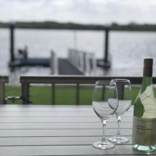 Фотография гостевого дома Quiet River Front Escape Walk to Ocean Street & Shops