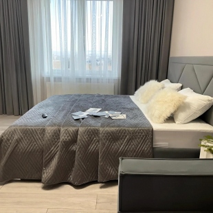 Фотография квартиры Квартира Однокомнатный Лофт с Панорамным Видом на Горы в Центре