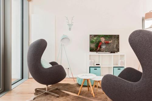 Фотография гостевого дома Ostsee - Reetdachhaus Nr 12 "Strandläufer" im Strand Resort