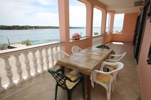 Фотография гостевого дома Apartments by the sea Pasman - 8221