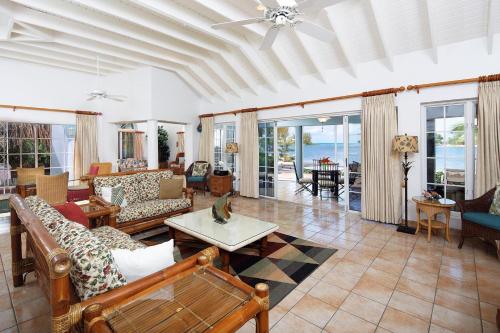 Фотографии гостевого дома 
            Sea Cove by Grand Cayman Villas