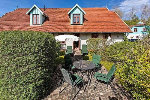 Фотография гостевого дома Ferienhaussiedlung Strandperlen Buchenhof 4c (Typ V)