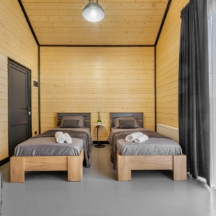 Фотография Коттеджа Частный дом AURA уютный домик с двумя кроватями