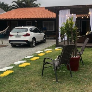 Фотография гостевого дома Pinheira Beach House com Jacuzzi