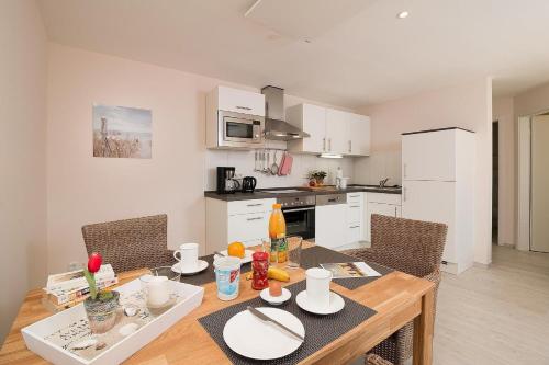 Фотография гостевого дома D4 Bungalow - Haus Dünenpark Königsberger Allee 12 - FERIENDOMIZIL HOLLICH