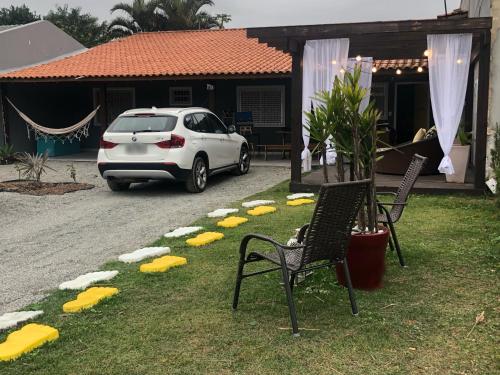 Фотографии гостевого дома 
            Pinheira Beach House com Jacuzzi