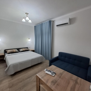 Фотография квартиры Апартаменты Уютные однокомнатные апартаменты для семьи с детьми