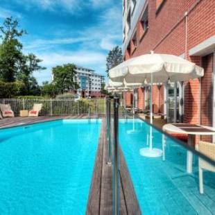 Фотографии апарт отеля 
            Zenitude Hôtel-Résidences Le Parc de l'Escale