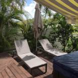 Фотография гостевого дома Maison de 2 chambres a Le Diamant a 600 m de la plage avec piscine privee jardin clos et wifi