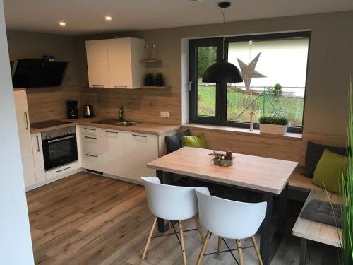 Фотография гостевого дома Ferienhaus "Haus Sommerstieg"