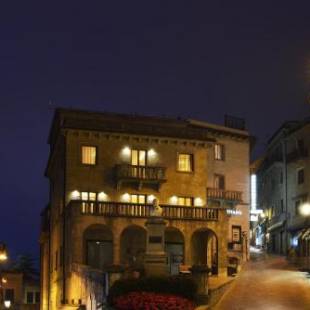 Фотографии гостиницы 
            Titano Suites