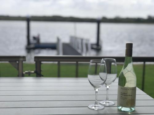 Фотография гостевого дома Quiet River Front Escape Walk to Ocean Street & Shops