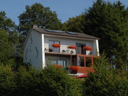 Фотография гостевого дома Modish Holiday Home in Waimes with Sauna