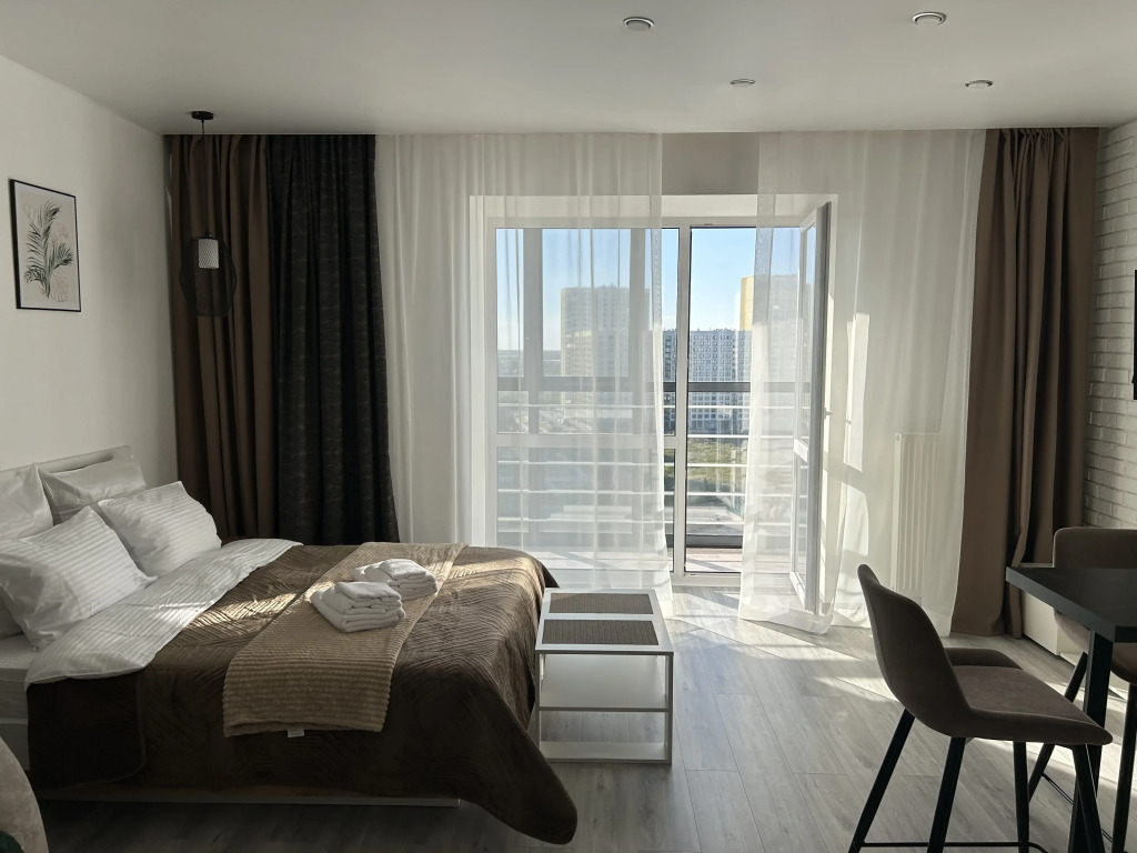 Фотография квартиры Квартира Просторная студия с панорамным видом из окна