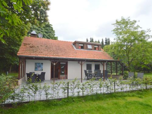 Фотография гостевого дома Cozy Holiday Home in Uden with Private Garden