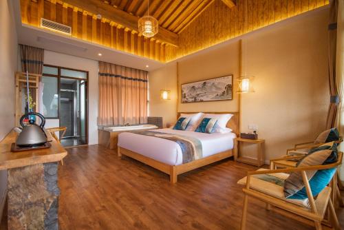 Фотография гостевого дома 花筑 腾冲山居秋暝精品客栈和顺古镇店