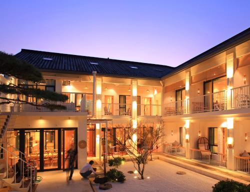 Фотография мини отеля Hangzhou Shange Laolongjing Hotel