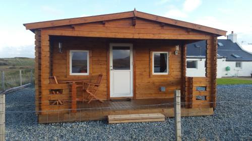 Фотография гостевого дома Harlosh Log Cabins