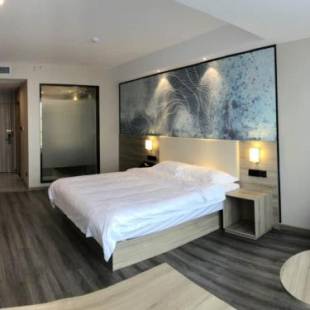 Фотографии гостиницы 
            GreenTree Eastern Huai'an Railway Station Mandu Plaza Hotel