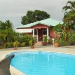 Фотография гостевого дома Maison de 2 chambres avec piscine partagee jardin clos et wifi a Petit Canal