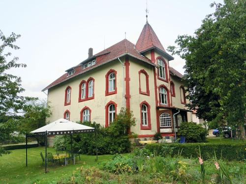 Фотография гостевого дома Lovely Farmhouse in Friedrichsfeld with Garden