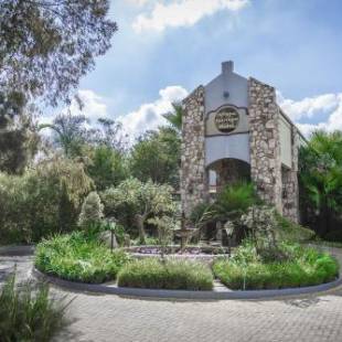 Фотографии гостиницы 
            Afrique Boutique Hotel O.R. Tambo