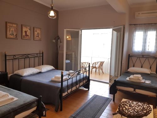 Фотография гостевого дома Exarchos Guest House