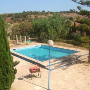 Фотографии гостевого дома 
            2 bedrooms house with shared pool and enclosed garden at Cartagena