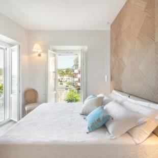 Фотографии гостевого дома 
            AQUAMADRE Suites