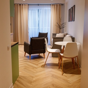 Фотография квартиры Апартаменты Современные апартаменты с отдельной спальней и гостиной в центре Нового Гудаури здание NEO