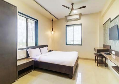 Фотографии гостиницы 
            Hotel New Elite Inn - MIDC, Navi Mumbai