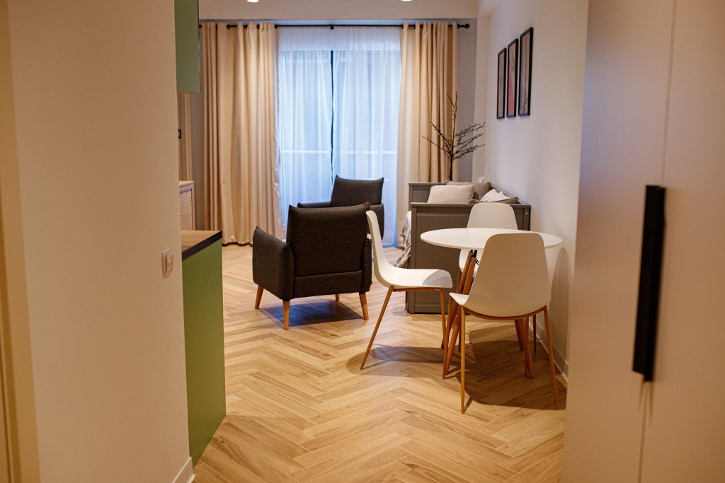 Фотография квартиры Апартаменты Современные апартаменты с отдельной спальней и гостиной в центре Нового Гудаури здание NEO