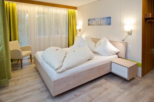 Фотография гостиницы Hotel Garni Torkelbündte