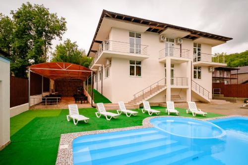 Фотография гостевого дома Изумрудные Холмы