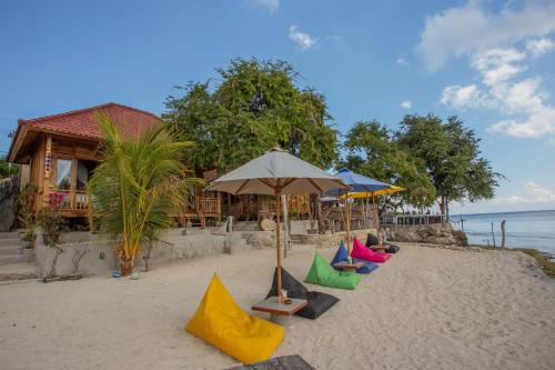 Фотография базы отдыха Wooden Beach Sunset Cottages