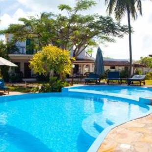 Фотографии гостиницы
Flame Tree Cottages