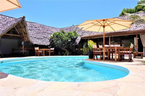 Фотография мини отеля Mvuvi Lodge Watamu