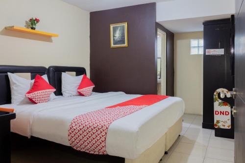 Фотография гостиницы OYO 989 Audah Guesthouse Syariah