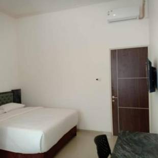 Фотографии гостиницы
OYO 1957 Riverside Residence