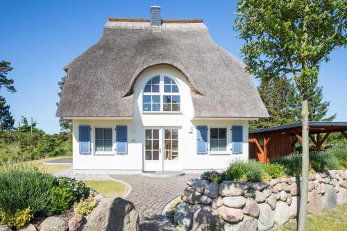 Фотография гостевого дома Ferienhaus Schilfrohrsaenger 48