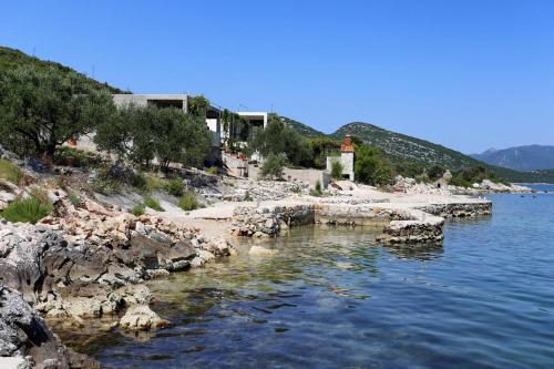 Фотография гостевого дома Apartments by the sea Cove Pjestata, Peljesac - 10210