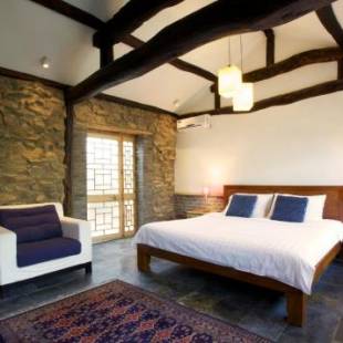 Фотографии гостиницы 
            Brickyard Retreat at Mutianyu Great Wall
