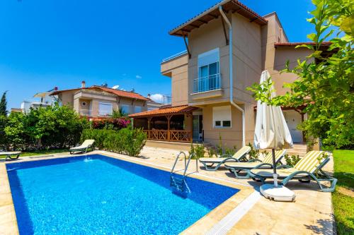 Фотография Коттеджа Paradise Town Villa Gordon