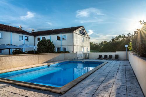 Фотография гостиницы Les Orchidées Logis, Hôtel & Restaurant