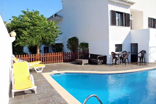 Фотографии гостевого дома 
            Moradia com piscina privada para Férias em Quarteira Algarve